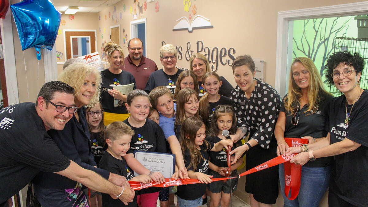 Paws & Pages ribbon cutting